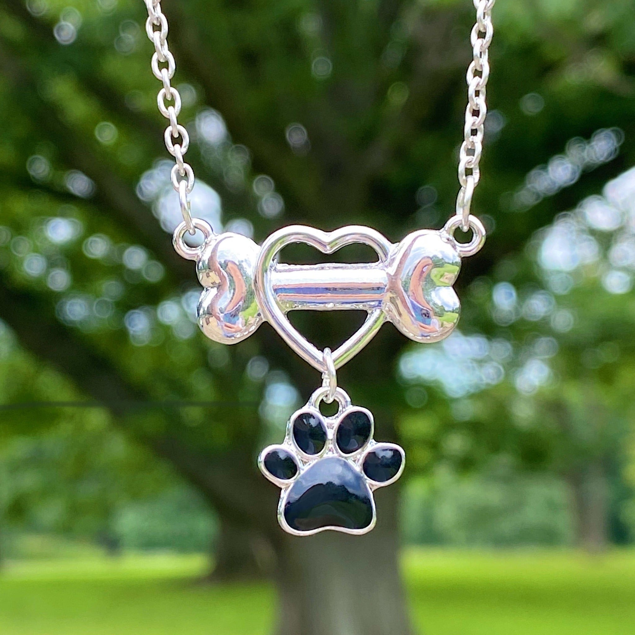 Dangling Heart Paw Necklace –